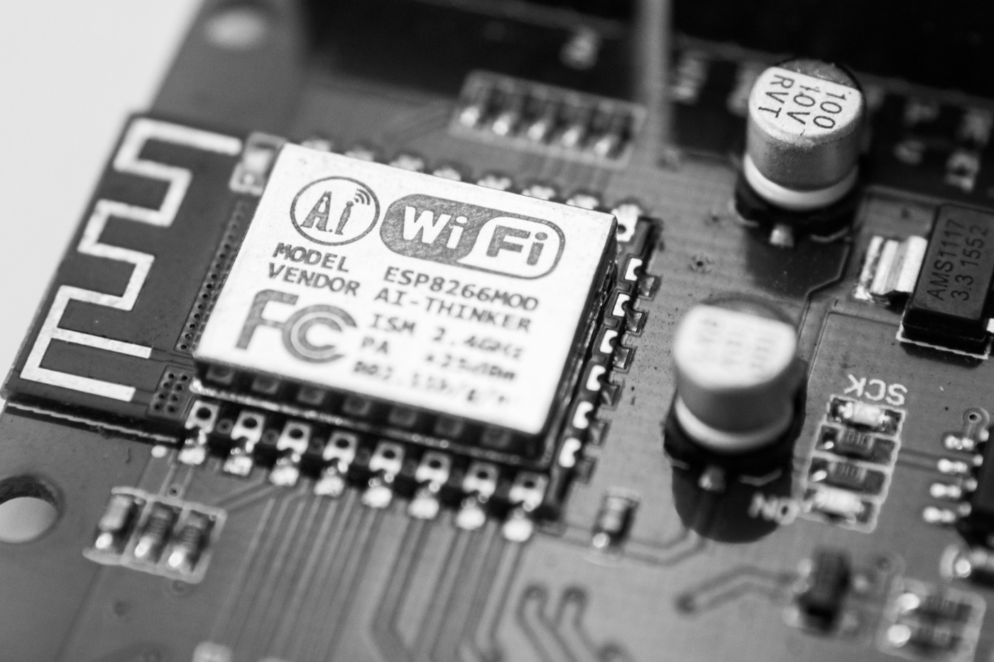 Commercial product electronics: close-up of a Wi-Fi module on a finished circuit board.